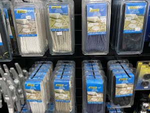 A display of various ropes and related items, highlighting different textures and colors.